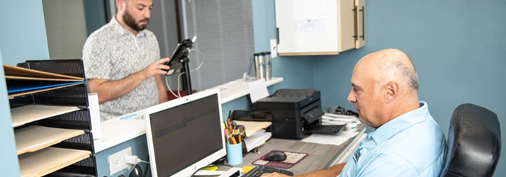 Chiropractor Baltimore MD Mark Stutman Welcoming Patient To Office