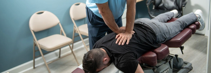 Chiropractor Laurel MD Mark Stutman Performing Adjustment