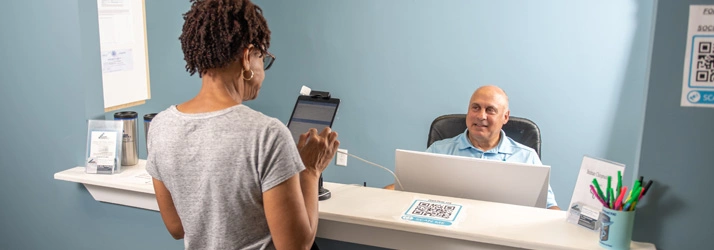 Chiropractor Laurel MD Mark Stutman Welcoming Patient To Office